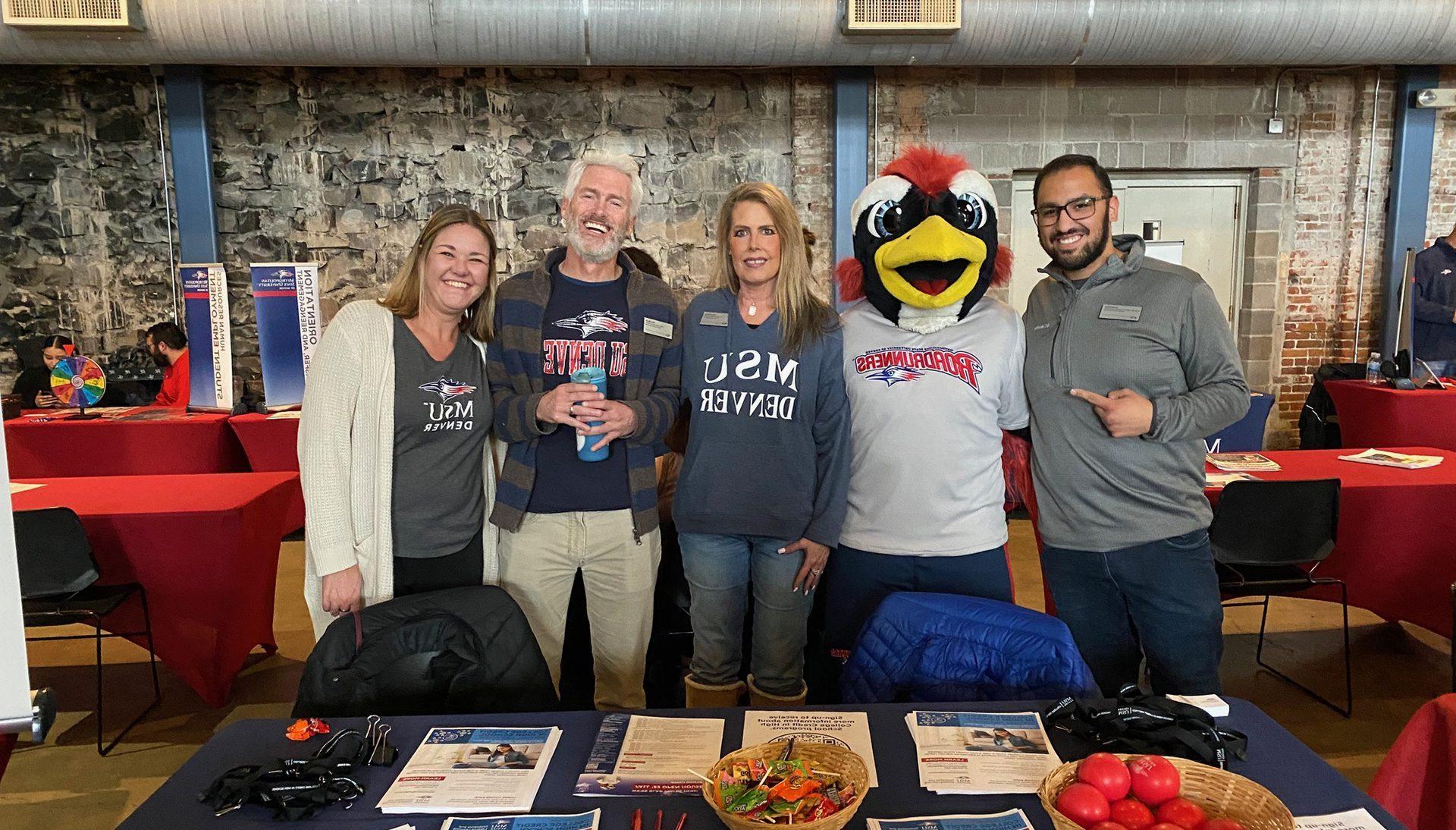 College Credit in High School team posing with Rowdy at an Open House on campus