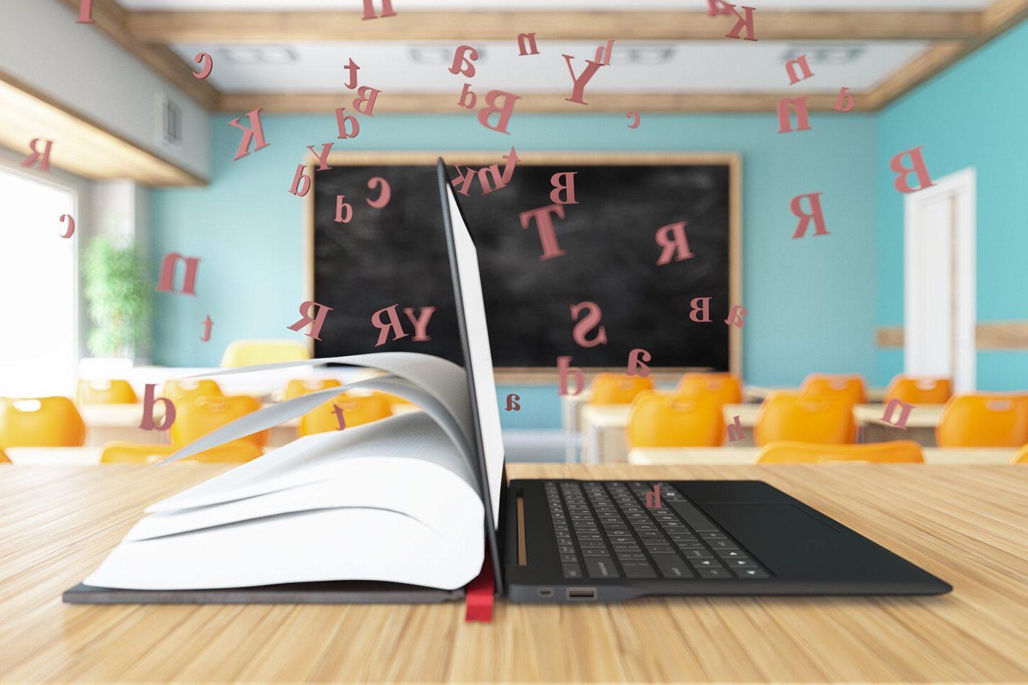 Computer on left and book on right showing the merging of educational resources